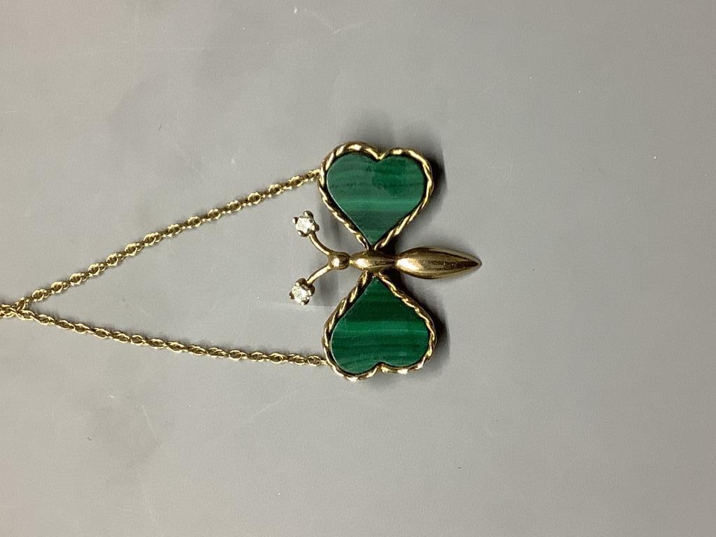 A modern 9ct gold malachite and diamond set butterfly pendant necklace, pendant width 29mm, gross weight 6.1 grams.